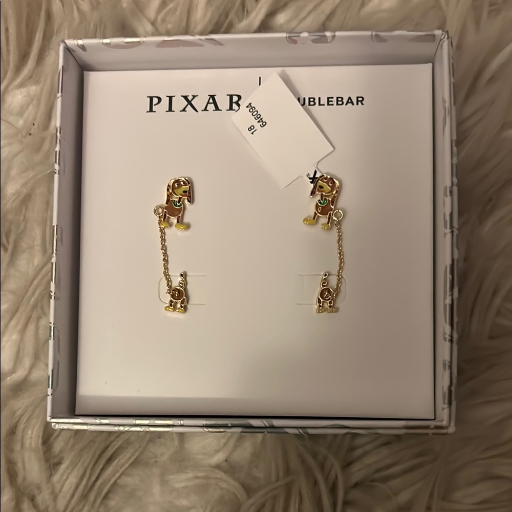 New in box Toy Story Pixar Slinky baublebar earrings
